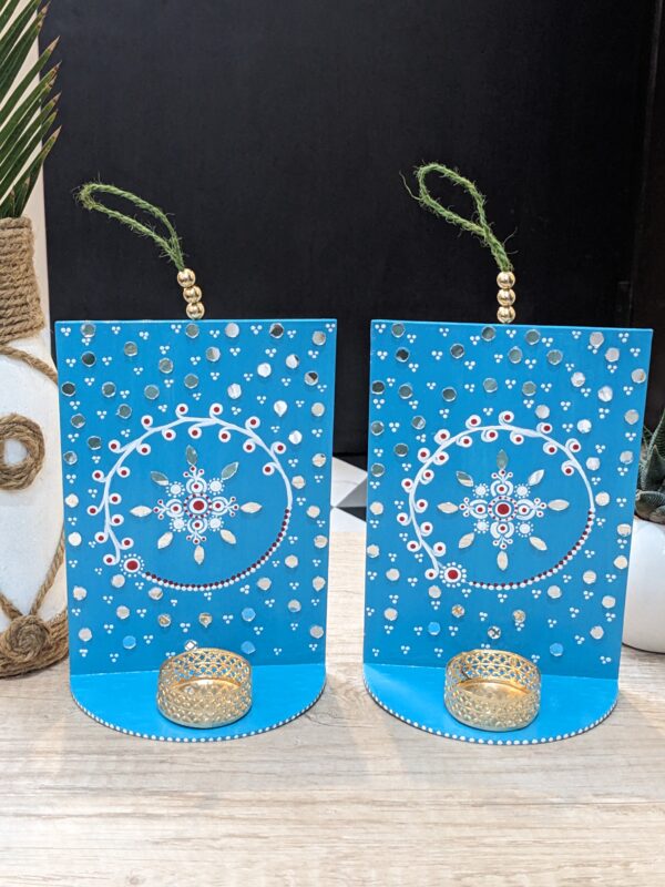 Pair of Blue T-light holders on wall hanging